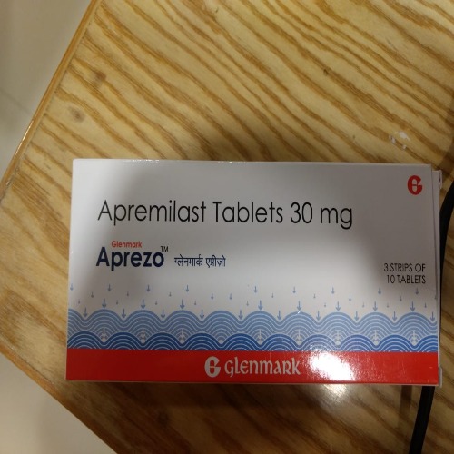 Aprezo 30mg outer carton box placed on wooden surface with branding and dosage strength