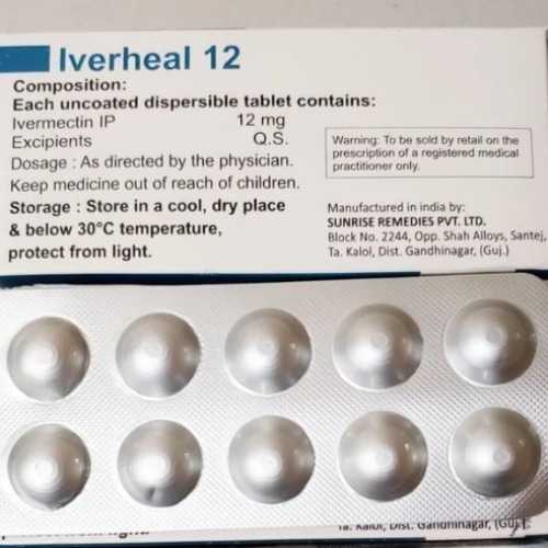 Iverheal 12mg (Ivermectin) silver blister pack showing 10 white round tablets with printed label text