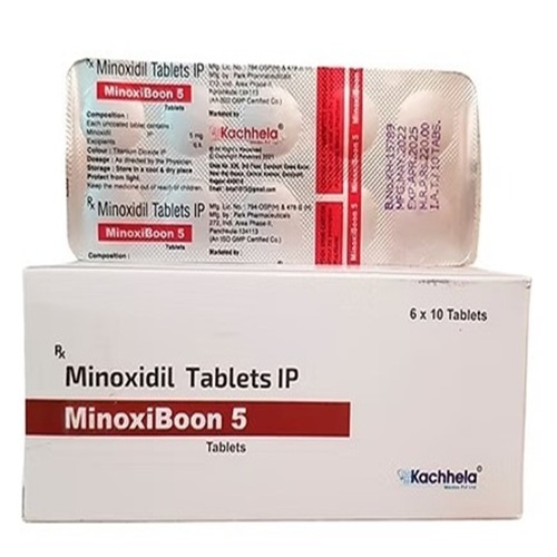Minoxiboon 5 blister pack close-up showing tablets and foil backing
