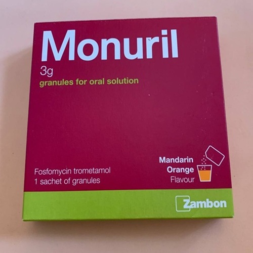 Monurol Granule 3g box and sachet arranged flat, product name clearly shown