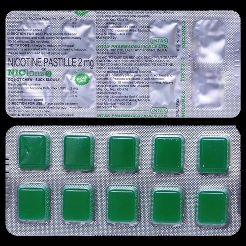 Niclonz 2mg blister strip close-up showing all 10 green pastilles and foil backing