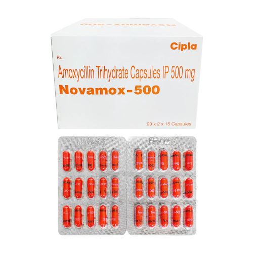 Novamox 500mg (Amoxicillin Trihydrate) large outer carton with multiple red capsules in blister packs neatly arranged