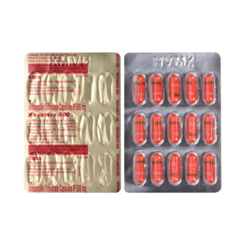 Novamox 500mg (Amoxicillin Trihydrate) close-up of silver blister packs containing red capsules displayed in rows