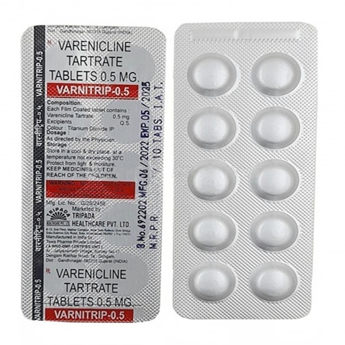 Varnitrip 0.5mg blister strip close-up showing white tablets and foil backing, leaflet text readable